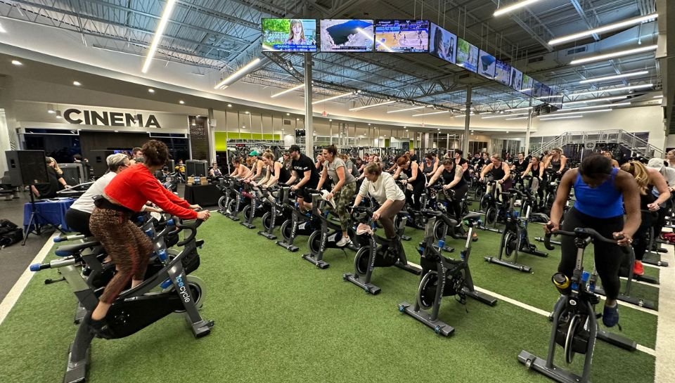 Catalyst Fitness member training with free weights