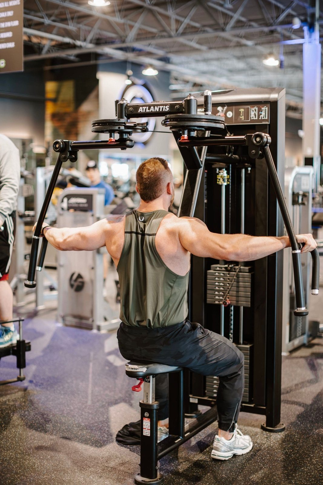 Athlete performing a cable fly in the gym